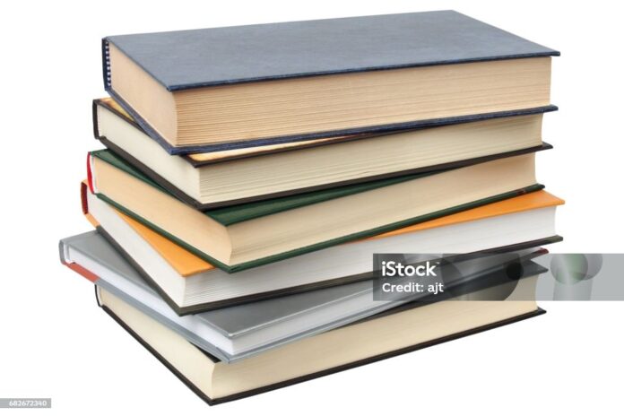 Short stack of books isolated on white background